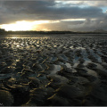 Sunset over a low tide on Musselburgh beach.