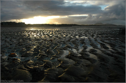 Sunset over a low tide on Musselburgh beach.