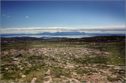 Looking West from the top of Applecross Pass.  The Isle of Raasay and the Isle of Skye can be seen in the background.